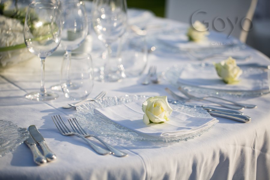 Table setting in gray by Goyo Catering.