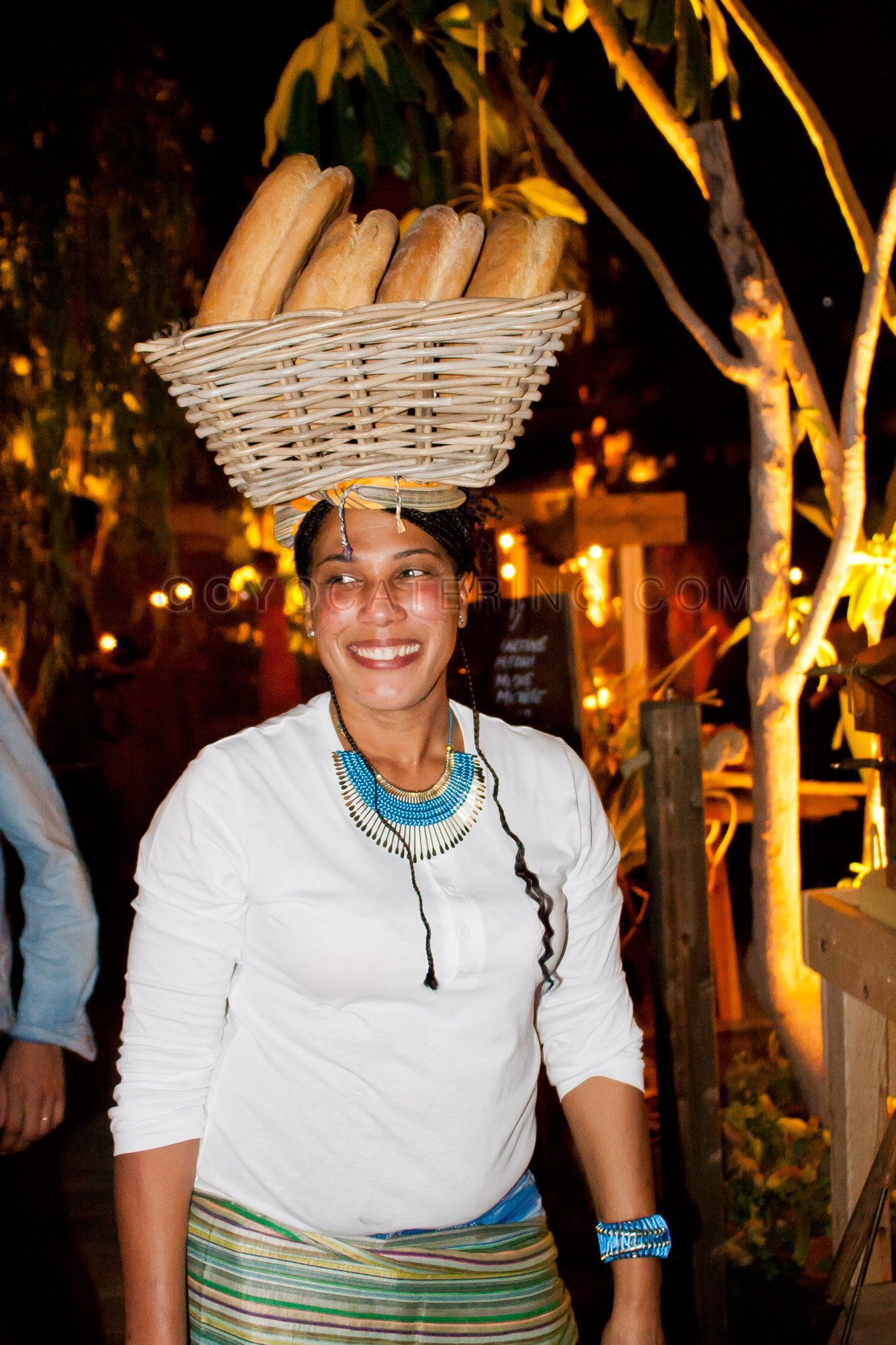 Serving the bread to our guests. | Goyo Catering