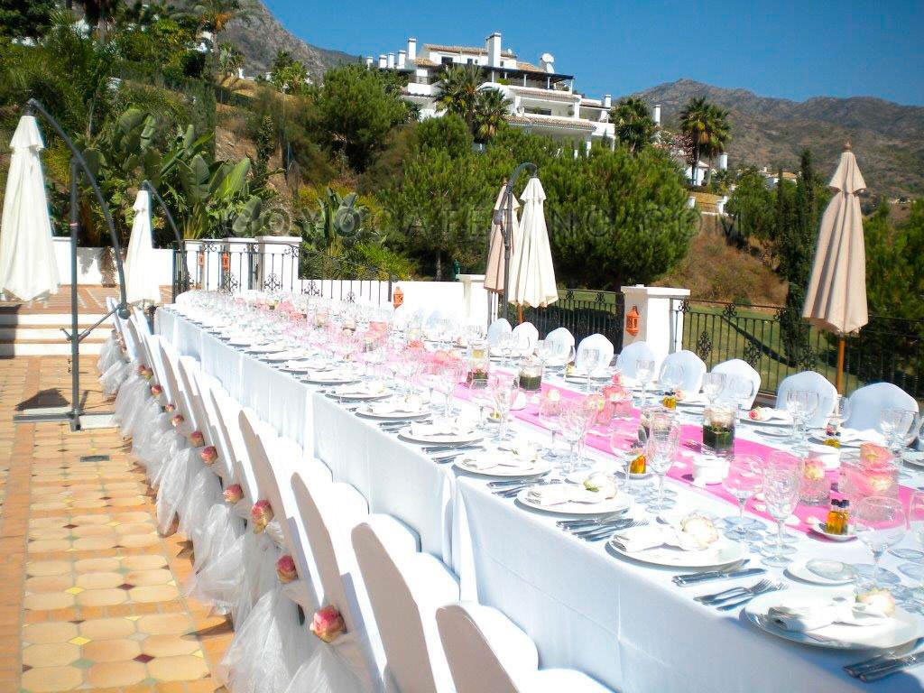 Table set up in white and pink. | Goyo Catering